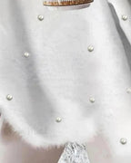 Magdalena | Jersey de punto con cuello de pico y perlas