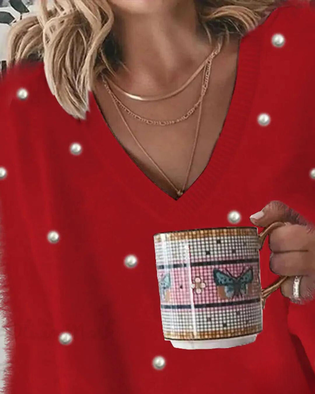 Magdalena | Jersey de punto con cuello de pico y perlas
