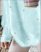Magdalena | Jersey de punto con cuello de pico y perlas