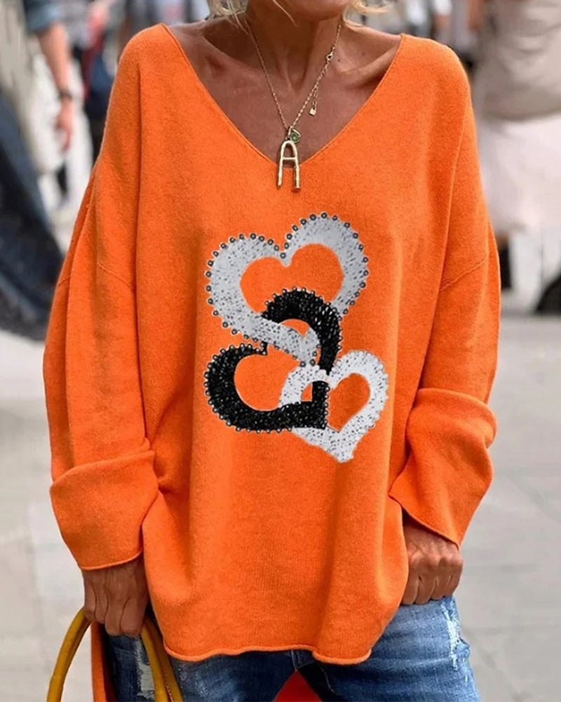 Mariona | Jersey de punto con corazones y escote en V