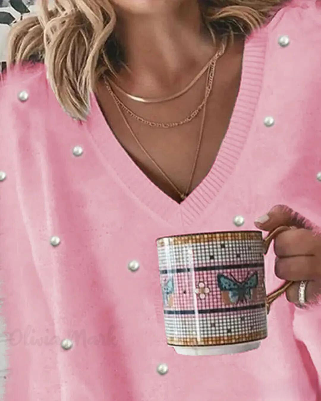 Magdalena | Jersey de punto con cuello de pico y perlas