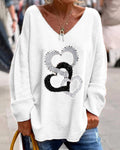 Mariona | Jersey de punto con corazones y escote en V