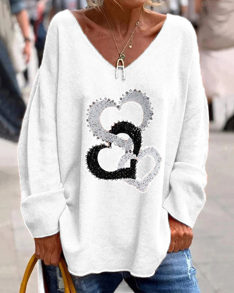 Mariona | Jersey de punto con corazones y escote en V