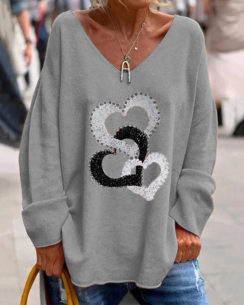Mariona | Jersey de punto con corazones y escote en V