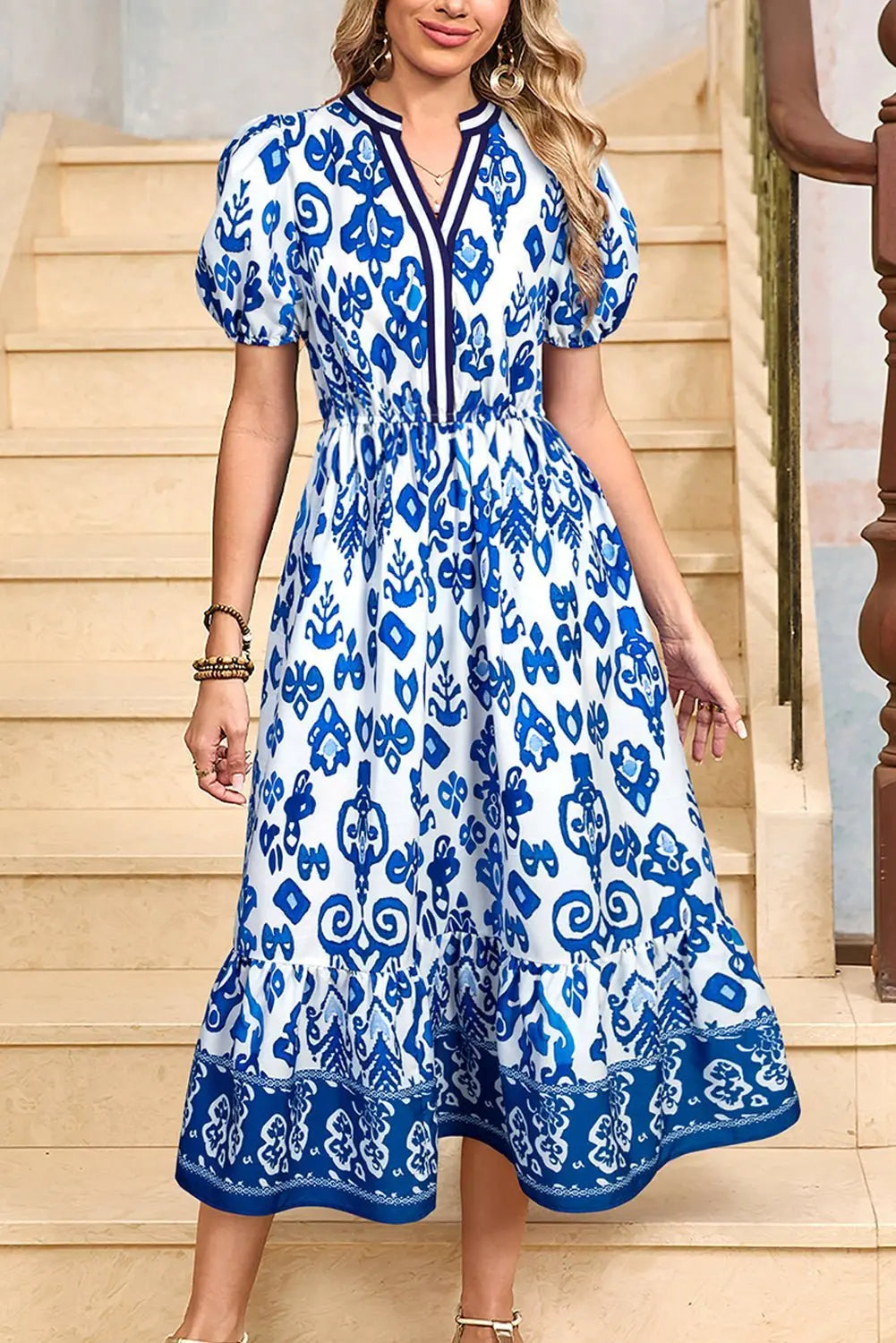 Tessa | Vestido midi boho con volantes y mangas abullonadas