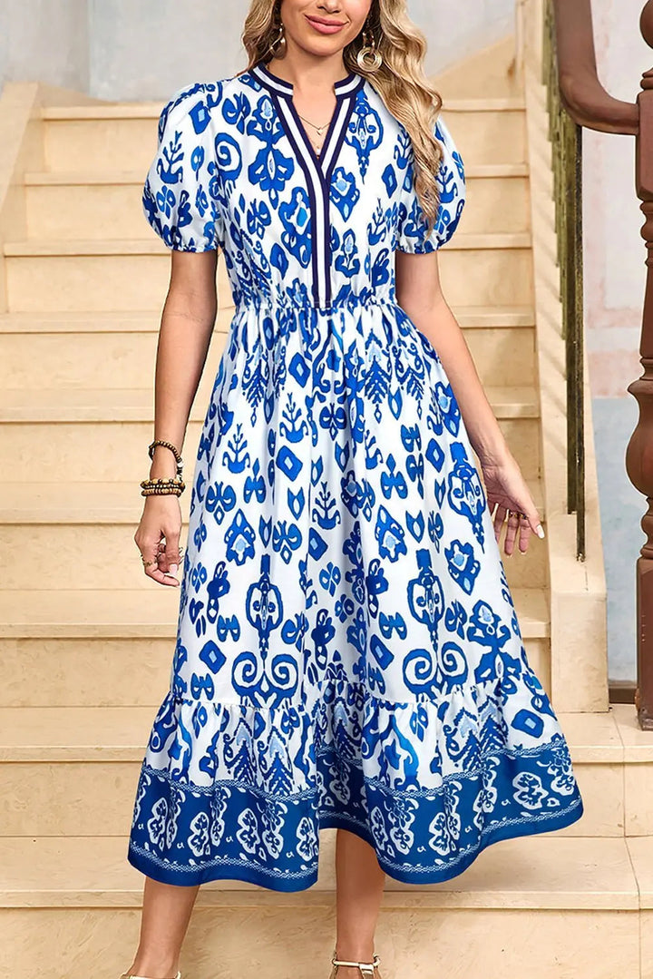 Tessa | Vestido midi boho con volantes y mangas abullonadas