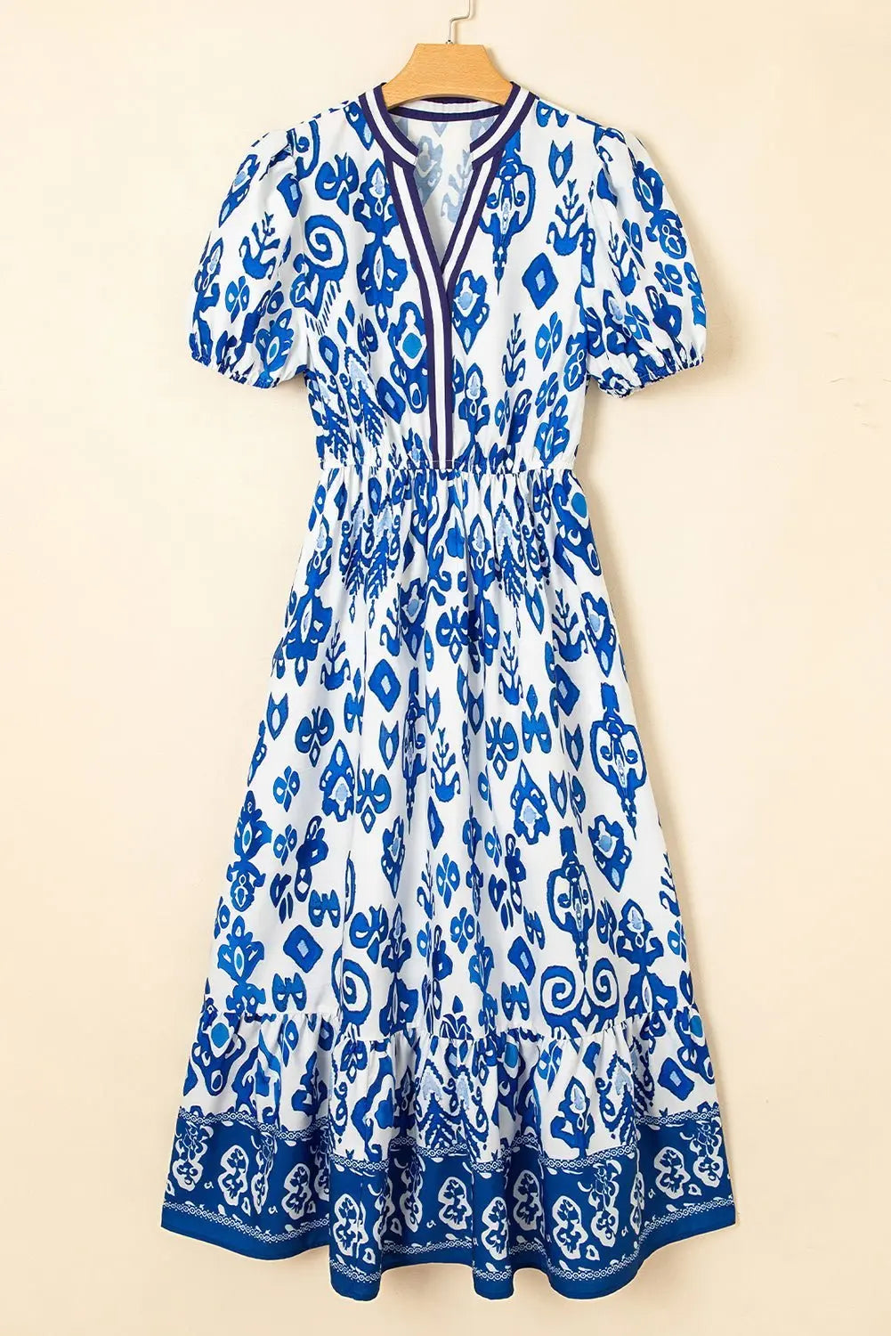 Tessa | Vestido midi boho con volantes y mangas abullonadas